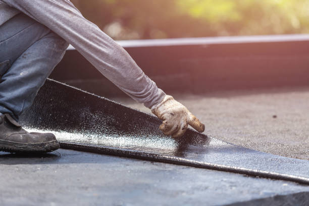 Professional Interior Drainage System technician working in Etna, OH